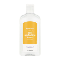 Tónico Amazon Basics hamamelis en botella para poros refinados.