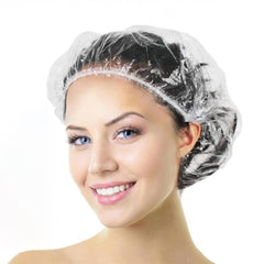 Tapa de ducha desechable grande clara de Aquior protege el cabello durante el lavado.