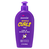 Aussie Miracle Curls, botella-desenredante, facilita desenredo suave de rizos y reduce nudos.