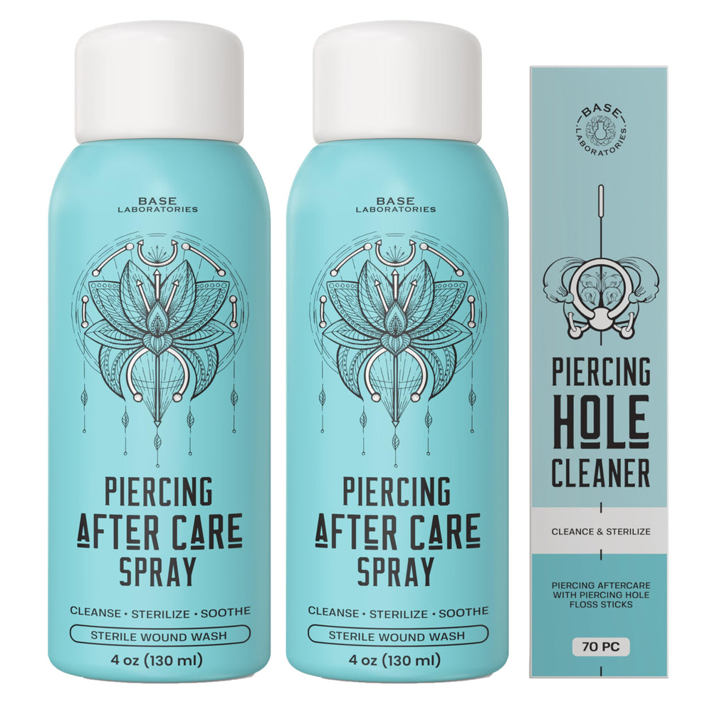 Spray de cuidado de perforaciones BASE LABORATORIES en botella de 4 oz para uso diario.