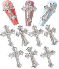 Cagzzee cruz incrustada en plata, ideal para realzar uñas con brillo.
