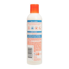 Cantu crema sin peso en rizos, definición suave y control de frizz.