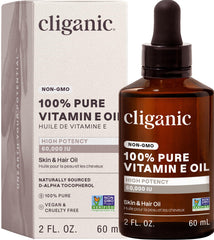 Cliganic aceite vitamina E 60,000 UI en botella, ideal para uso diario en piel.