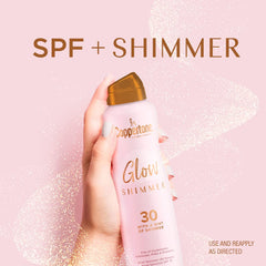 Coppertone Glow Shimmer SPF 30 being sprayed on arm