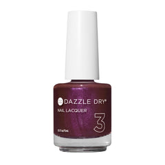Dazzle Dry Spiced Plum: botella mostrando color profundo con brillo rosado.