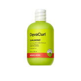 Botella DevaCurl CurlBond, limpiador suave para uso diario en rizos.