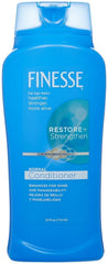 Acondicionador Finesse Restore: botella con cabello más suave y manejable