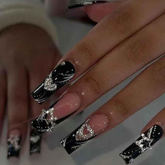 Uñas postizas Foccna largas con cristales negros, acabado cuadrado y brillo elegante.