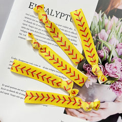 FOJOO gomas para cabello usadas como pulsera deportiva para un look práctico.