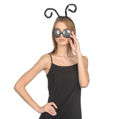 Detalle insecto llamativo de Funcredible que realza atuendos.