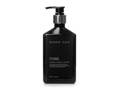 Gilchrist & Soames Warm Oak frasco de loción para hidratación suave de manos y cuerpo.