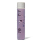 ion color defensa clarificante champú: botella en estante, ideal para cabello teñido.