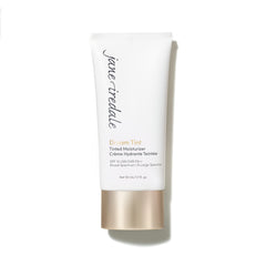 Dream Tint de jane iredale en envase con tono medio y SPF 15 para piel radiante.