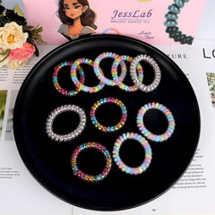 JessLab coletas espirales en colores brillantes, ideales para looks diarios.