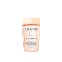 Kerastase Gloss Absolu: champú en botella, ideal para llevar y obtener brillo duradero.