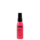 Keratin Complex Keratin Obsessed Spray: botella elegante para control del frizz y brillo.