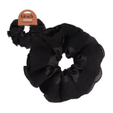 Kitsch coletero plisado negro, sin pliegues, para un peinado suave y elegante.