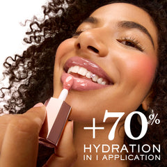 Aplicador jumbo de JuicyTreat recubre y perfila los labios con precisión.