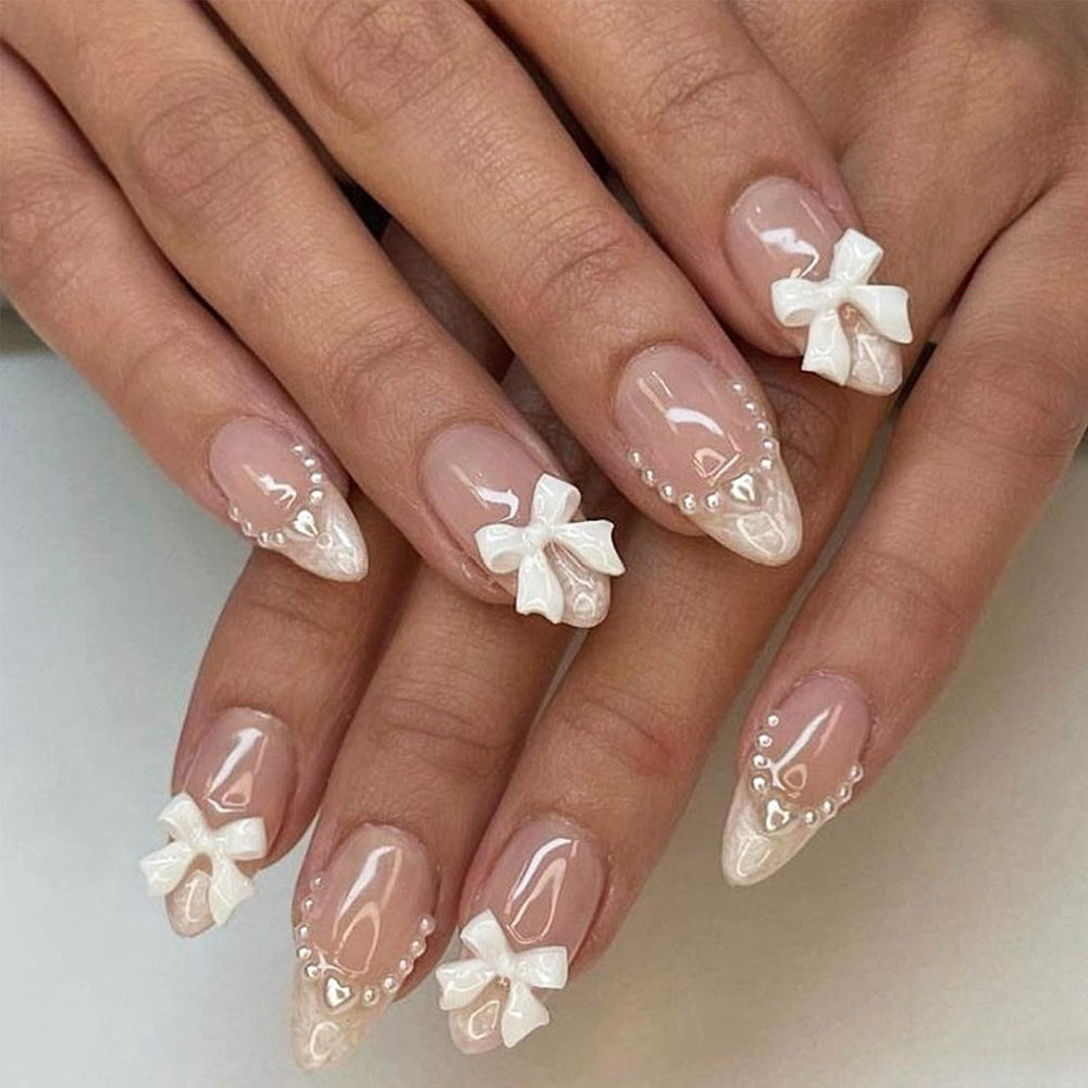 LRKNNO uñas en almendra francesas con lazo decorativo para un toque elegante.