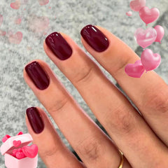 Modelones uñas postizas cortas rojas squoval para un look rápido.