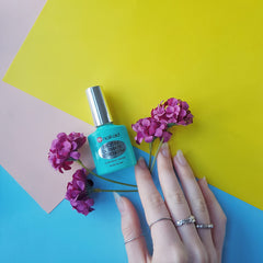 Nail-Aid Biotin Ultimate Strength como base o capa superior para duración.