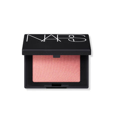 NARS Orgasm polvo rubor mini para viaje con brillo dorado.