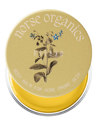 Bálsamo Norse Organics Acne Dorso, ayuda a calmar brotes en la espalda.