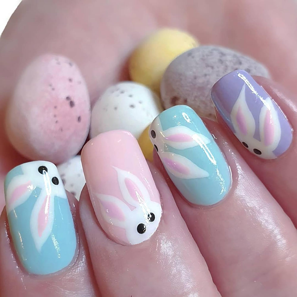 Uñas postizas OCOUYVD Pascua con diseño de conejito para look festivo.