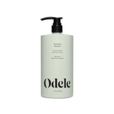 Odele Champú Suavizante, botella vertiendo, hidratación profunda para el cabello