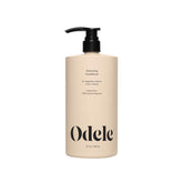 Odele Volumizing Conditioner, botella vertido: brillo ligero y hidratación sin peso.