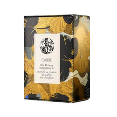 ORIBE Hair Alchemy acondicionador en botella protege la fibra y facilita el peinado