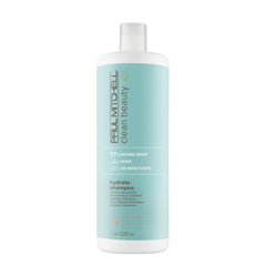 Frasco frontal de Paul Mitchell Clean Beauty Hydrate Shampoo, promueve hidratación suave para cabello seco.