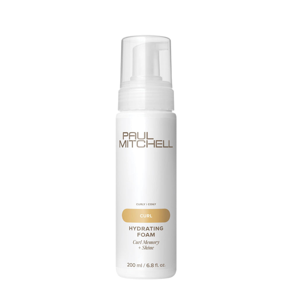 Espuma hidratante Paul Mitchell en botella para rizos definidos