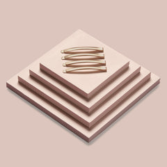 The Hair Edit pins oro-modernos: diseño elegante que acentúa cualquier estilo.