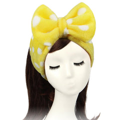 Diadema Shintop con puntos amarillos para maquillaje cómodo.