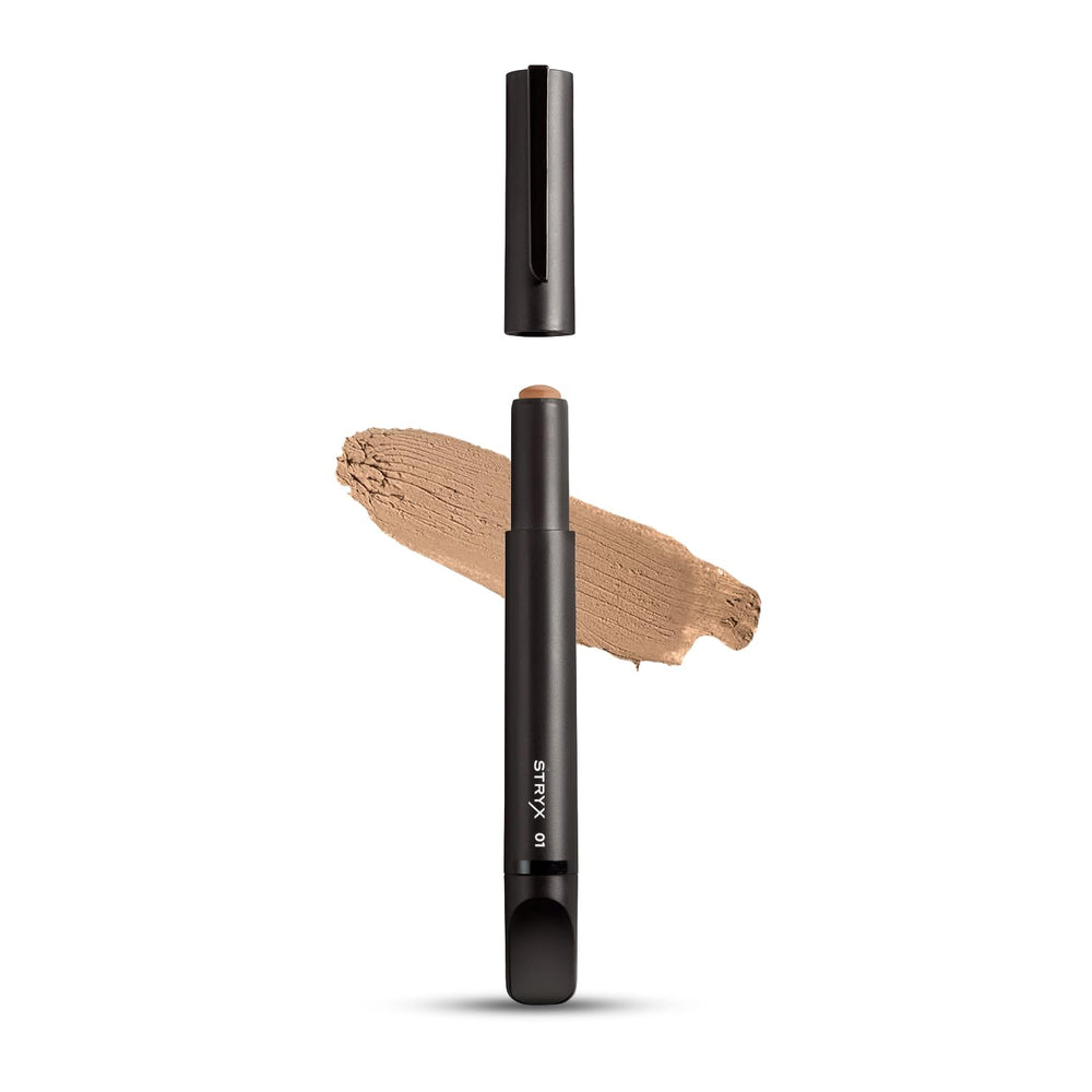 Stryx corrector para caballero, tono caoba mediano, cubre imperfecciones de forma natural.