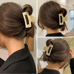 Textention clip para pelo carey rectangular, ideal para peinados rápidos.
