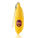 TONYMOLY balsamo labial de platano en envase compacto, ideal para uso diario.