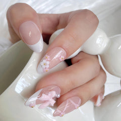 VELINNA Coquette uñas almendra de longitud media, look elegante para reuniones.