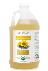 Velona aceite de girasol orgánico en botella, hidratación suave para la piel.