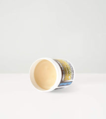 WaveBuilder Pomada cacao y karité, textura cremosa para aplicación uniforme.