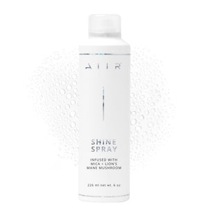 AIIR Shine Spray, botella brillante para un acabado luminoso y suave.