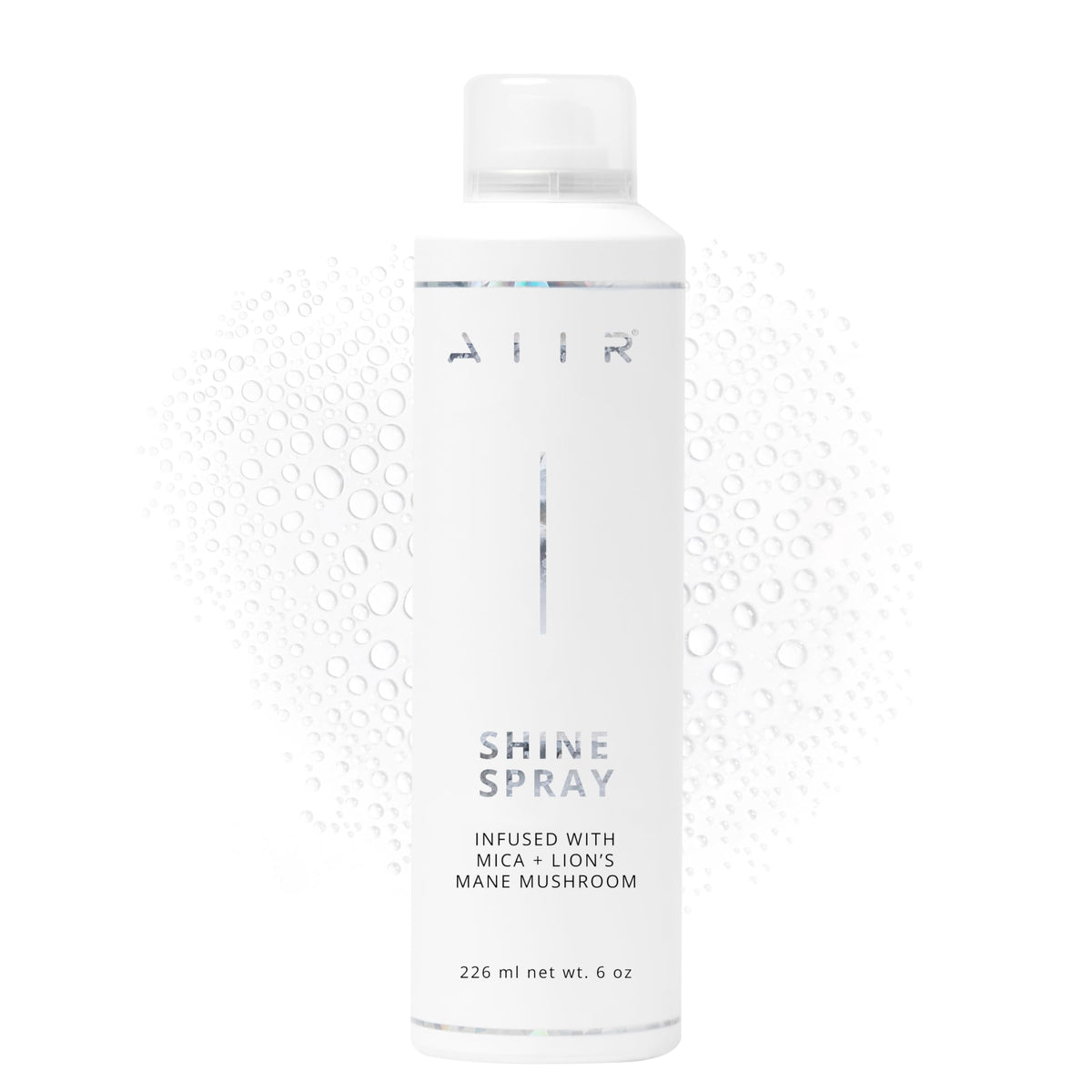 AIIR Shine Spray, botella brillante para un acabado luminoso y suave.
