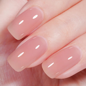 Esmalte gel AILLSA rosa claro translúcido para acabado natural y duradero.
