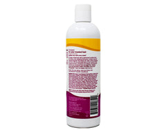 Etiqueta clara de Alba Botanica Champú Plumeria Replenishing con aroma floral