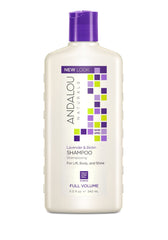 Andalou Naturals champú volumen lavanda biotina, frasco vertido para mayor cuerpo y brillo.