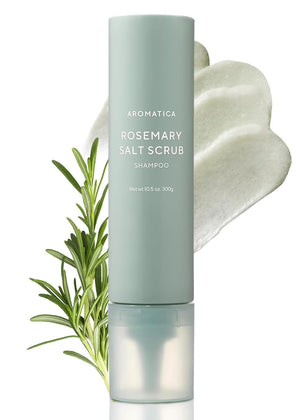 AROMATICA champú sal romero: botella visible para exfoliar suavemente el cuero cabelludo.