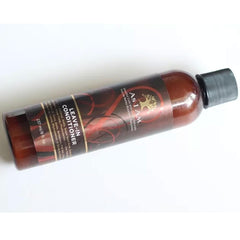 Textura suave y manejable del cabello con As I Am.