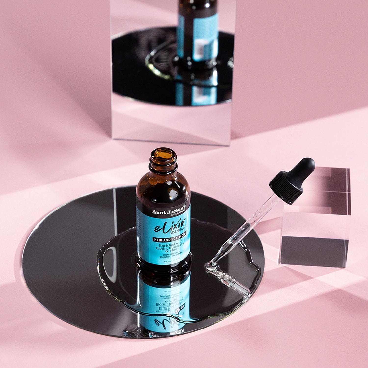 Nutrición de hebras con Elixir Essentials de Aunt Jackie's