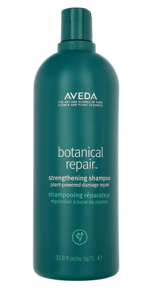 Aveda Botanical Repair Shampoo: botella frente, limpieza suave para cabello dañado.